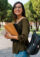 Young woman walking to class